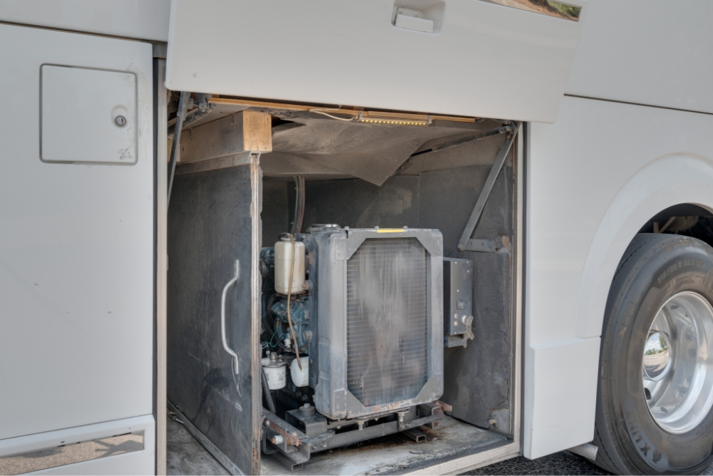 View of a mechanical component in the side compartment of a Prevost H345 bus, showcasing essential systems for bus functionality and performance.