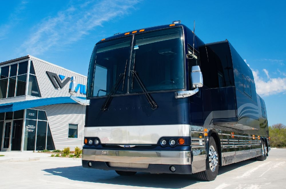Parked 2006 Prevost XLII entertainer bus for sale, offering a spacious and high-end coach design.