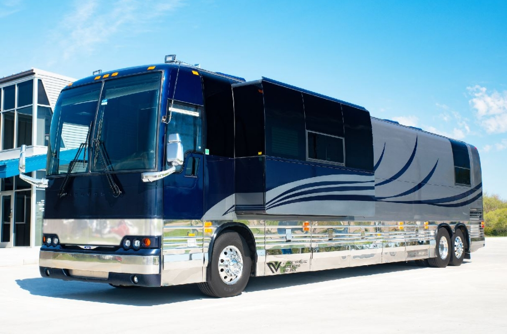 Angled view of a 2006 Prevost XLII bus conversion for sale, ideal for luxury travel or entertainer bus use.