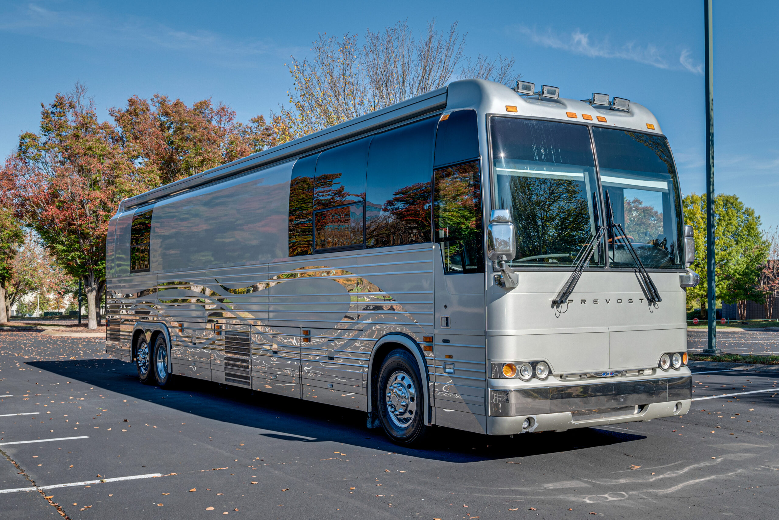 Exterior picture of 6 bunk entertainer bus for sale.