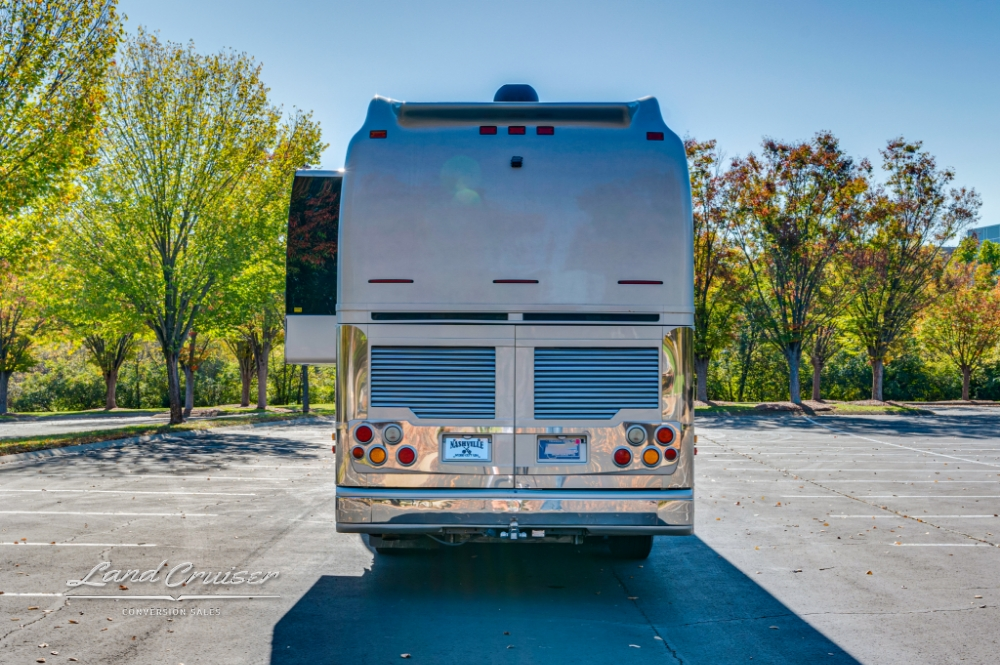 Rear open engine compartment in a 6 bunk Prevost entertainer bus.