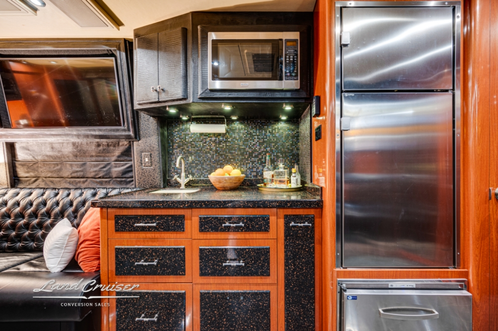Kitchenette of a 2006 Prevost XLII Entertainer Bus.