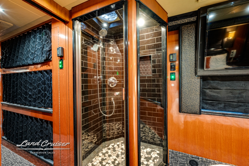 Tiled shower in a prevost bus conversion.
