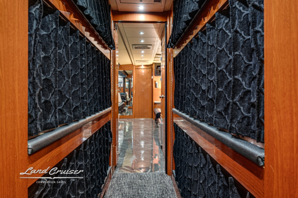 Hallway with bunk beds in 6 bunk 2006 Prevost XLII bus.