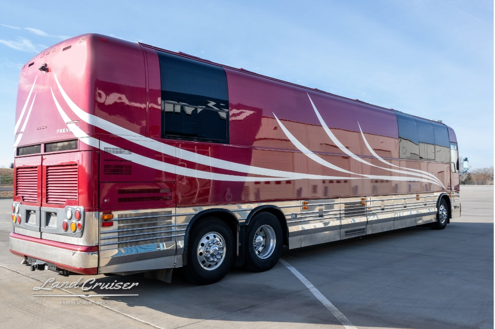Side view of the elegant white stripes on a 12 bunk entertainer