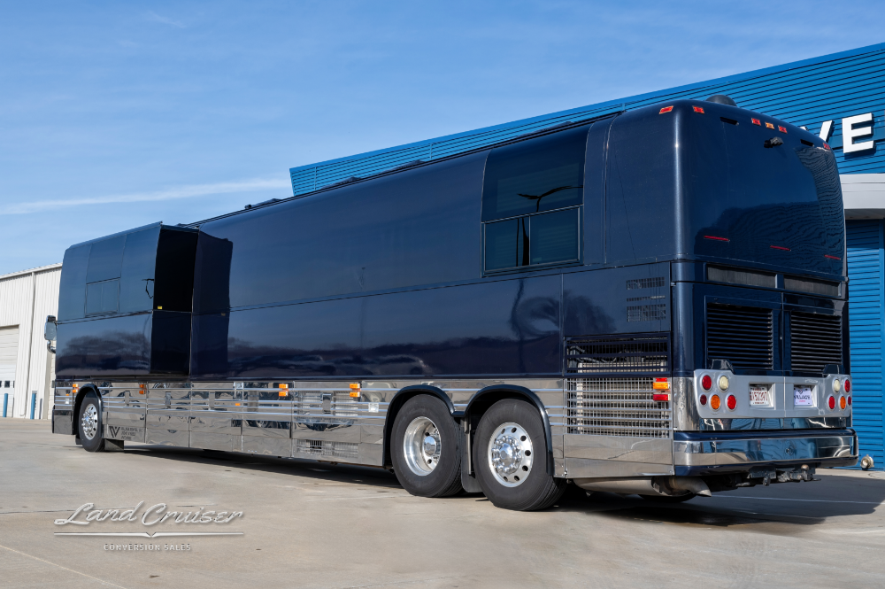 Side view of a Prevost Entertainer Bus showcasing 365 Bridgestone 16/32