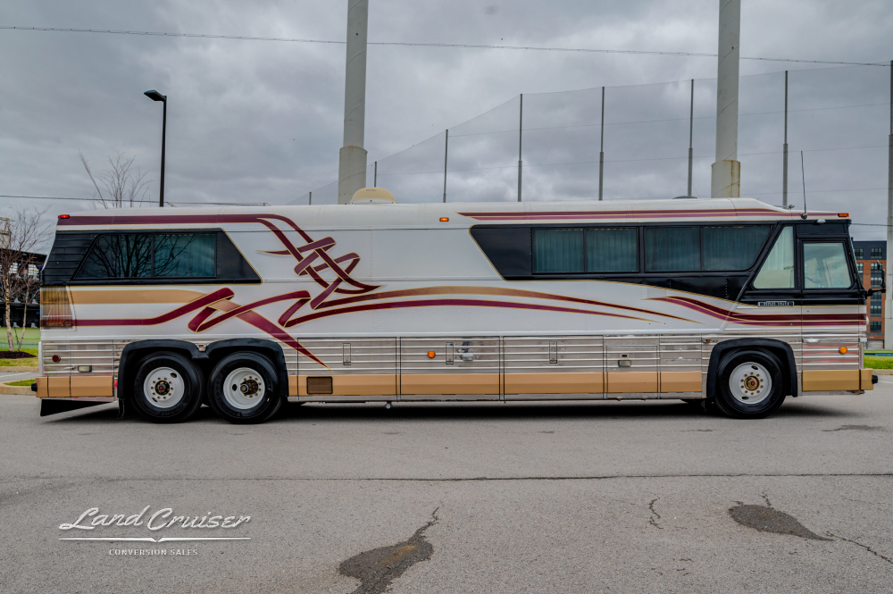 Side view of a MCI coach converted by Custom Coach Corporation