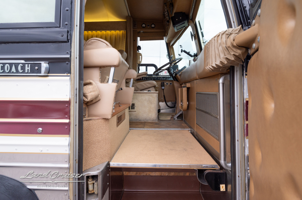 View of the drivers area from outside the bus conversion