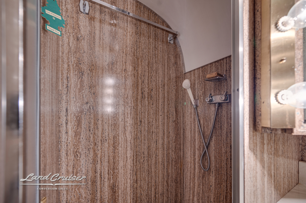 A view of the shower inside the bus.