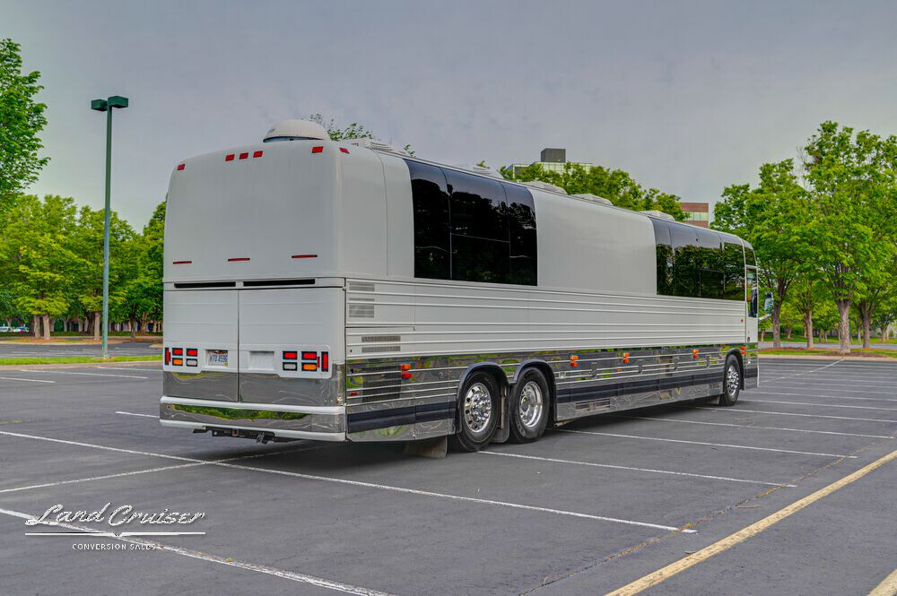 Side-rear view profile of bus conversion for sale