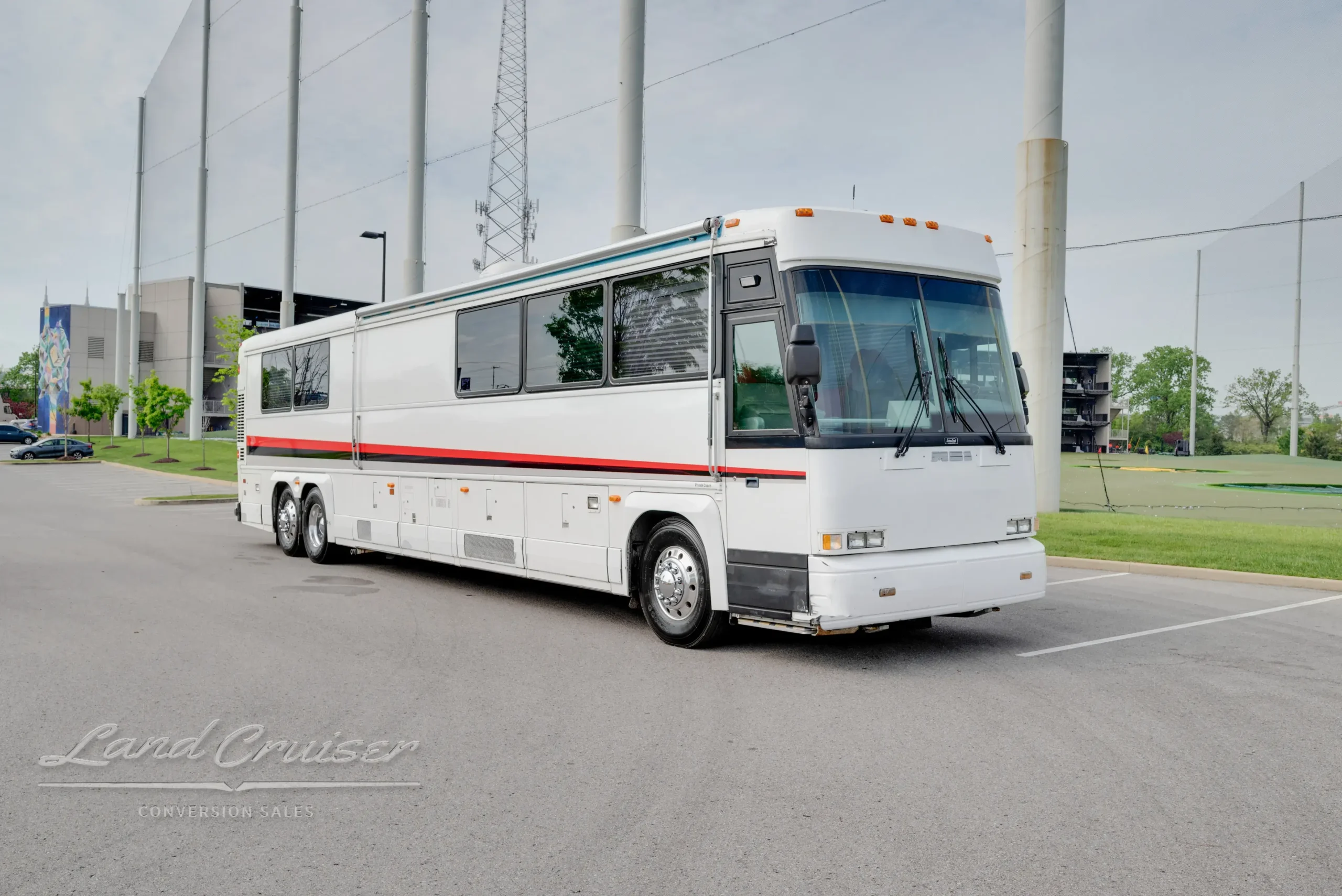 Side front view of 1998 MCI Bus Conversion for Sale