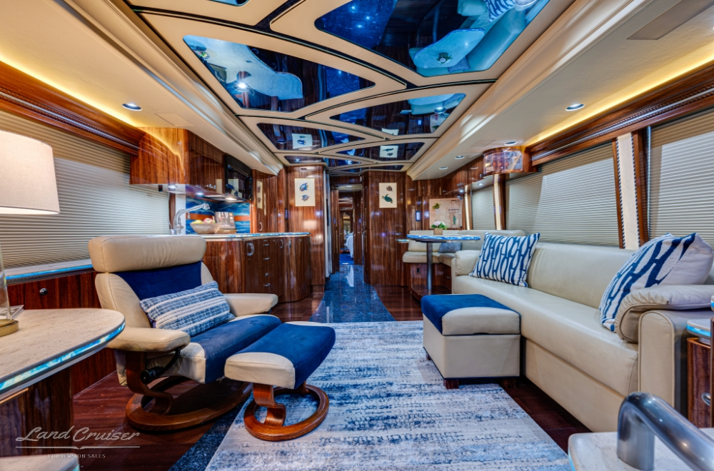 Lounge area with sofa and recliner of a 2009 prevost coach