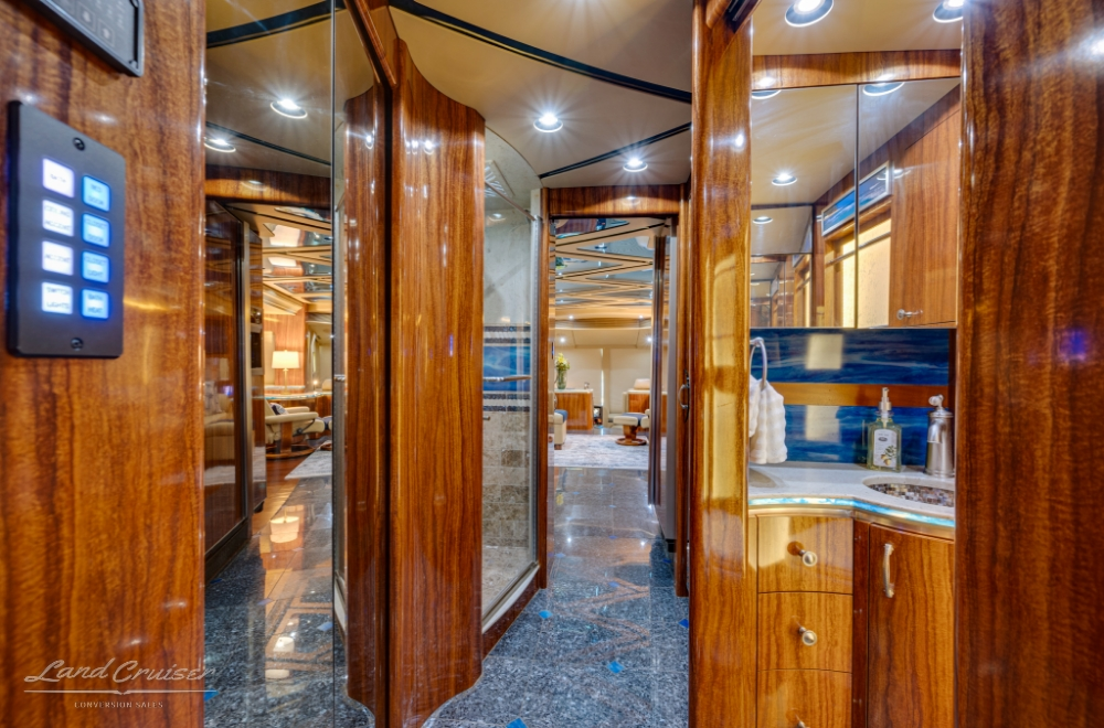 Interior of a hallway inside a prevost bus conversion for sale.