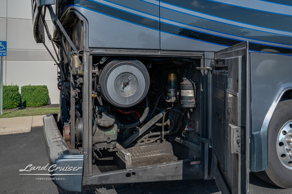 Closeup of the rear driver's side bay showing generator and mechanical components.