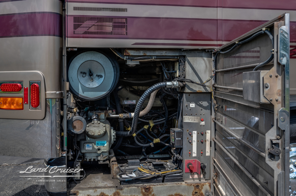Generator compartment showing Kohler 20kW setup on rear of Prevost XLII Custom Coach