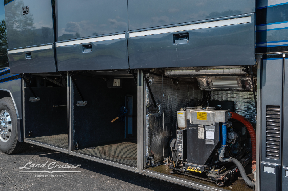 Service bay exposing one of the onboard generator systems neatly integrated behind metal framing.