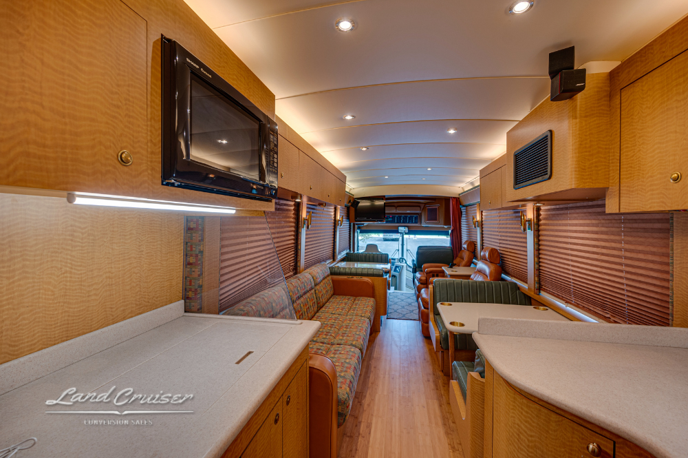Galley view looking toward rear bunk area in MCI motorhome
