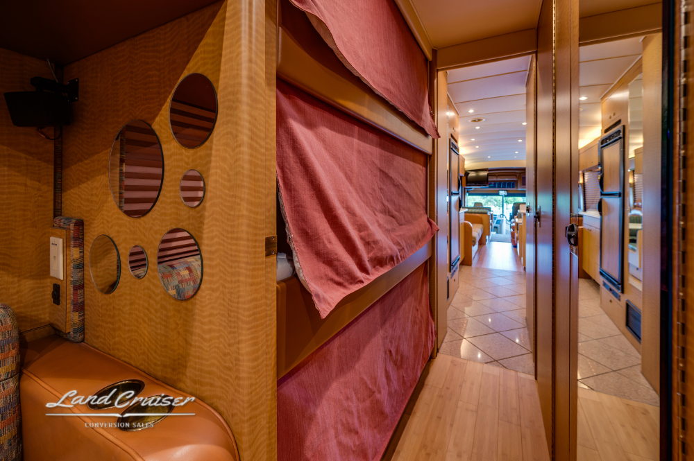 Shower with glass door and tiled walls inside MCI 102EL3