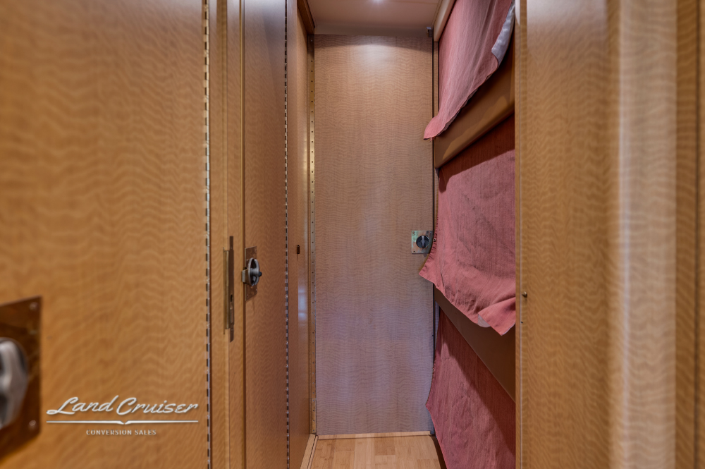 Privacy curtain closed in bunk area of MCI motorhome