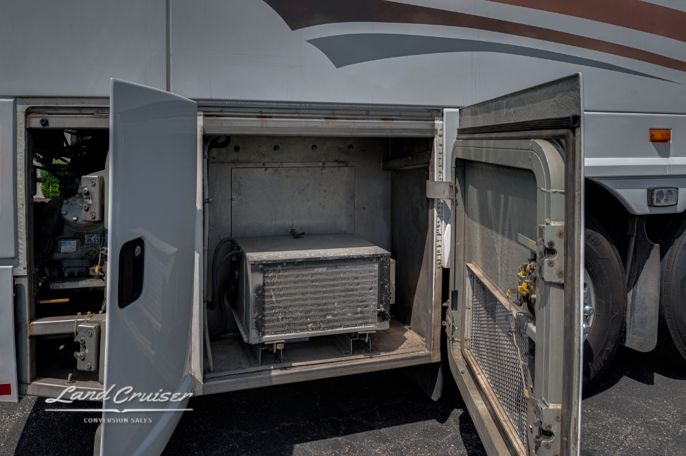 Storage bay with HVAC components on MCI 102EL3 coach