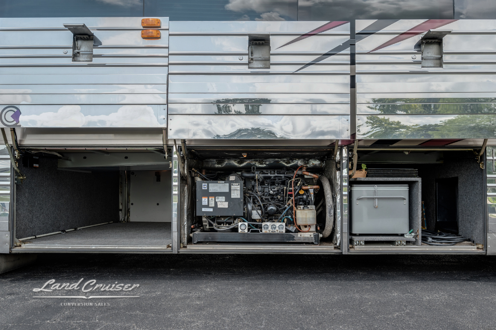 Detailed image of electrical systems and inverter unit in undercarriage bay of Prevost XLII