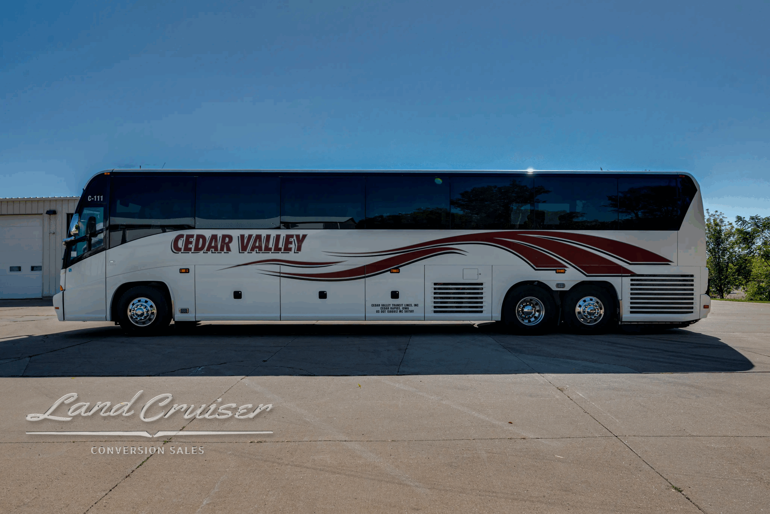 Driver-side full profile of the 45-ft × 102-in J4500 motorcoach.