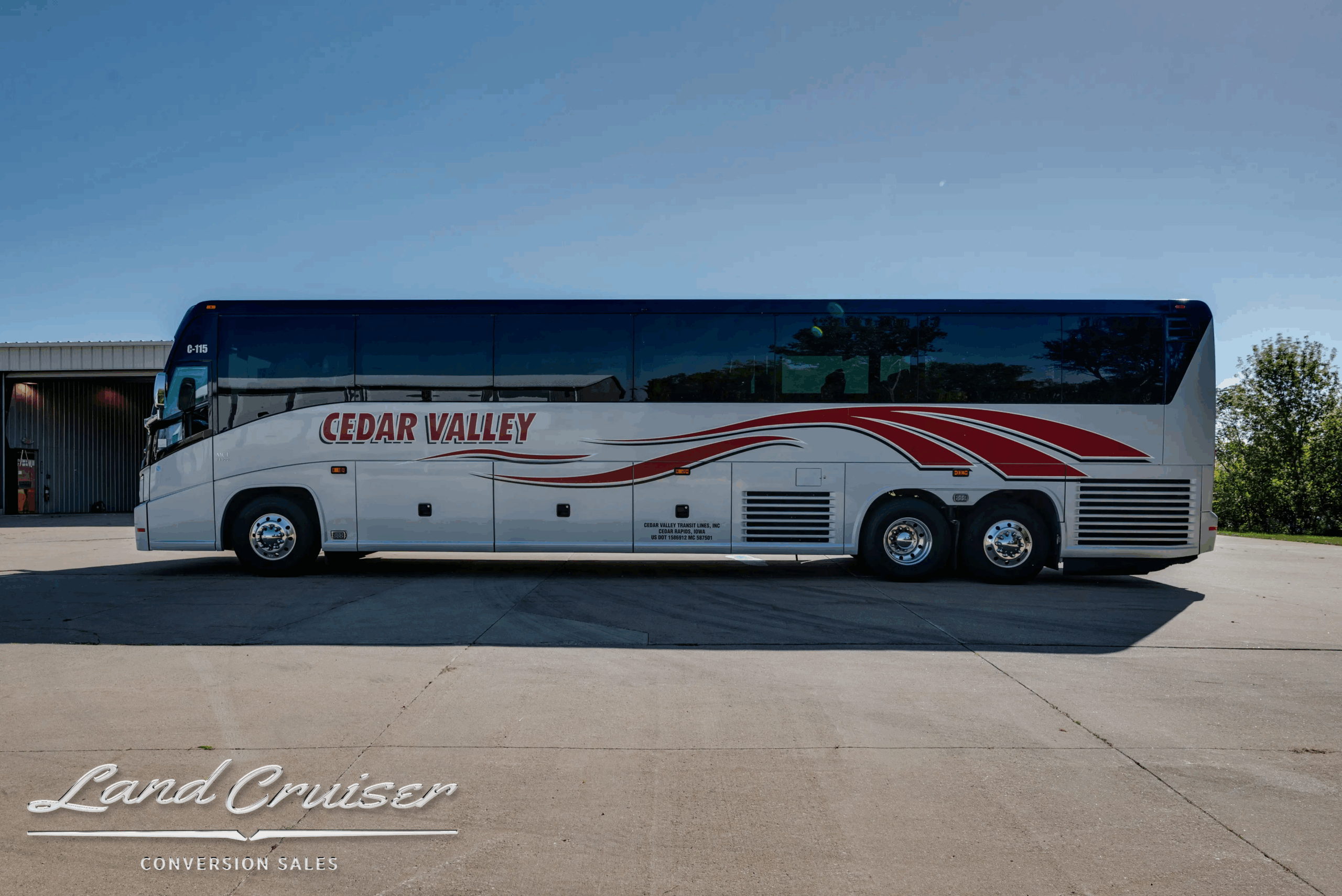 Passenger-side full profile with Cedar Valley graphics.