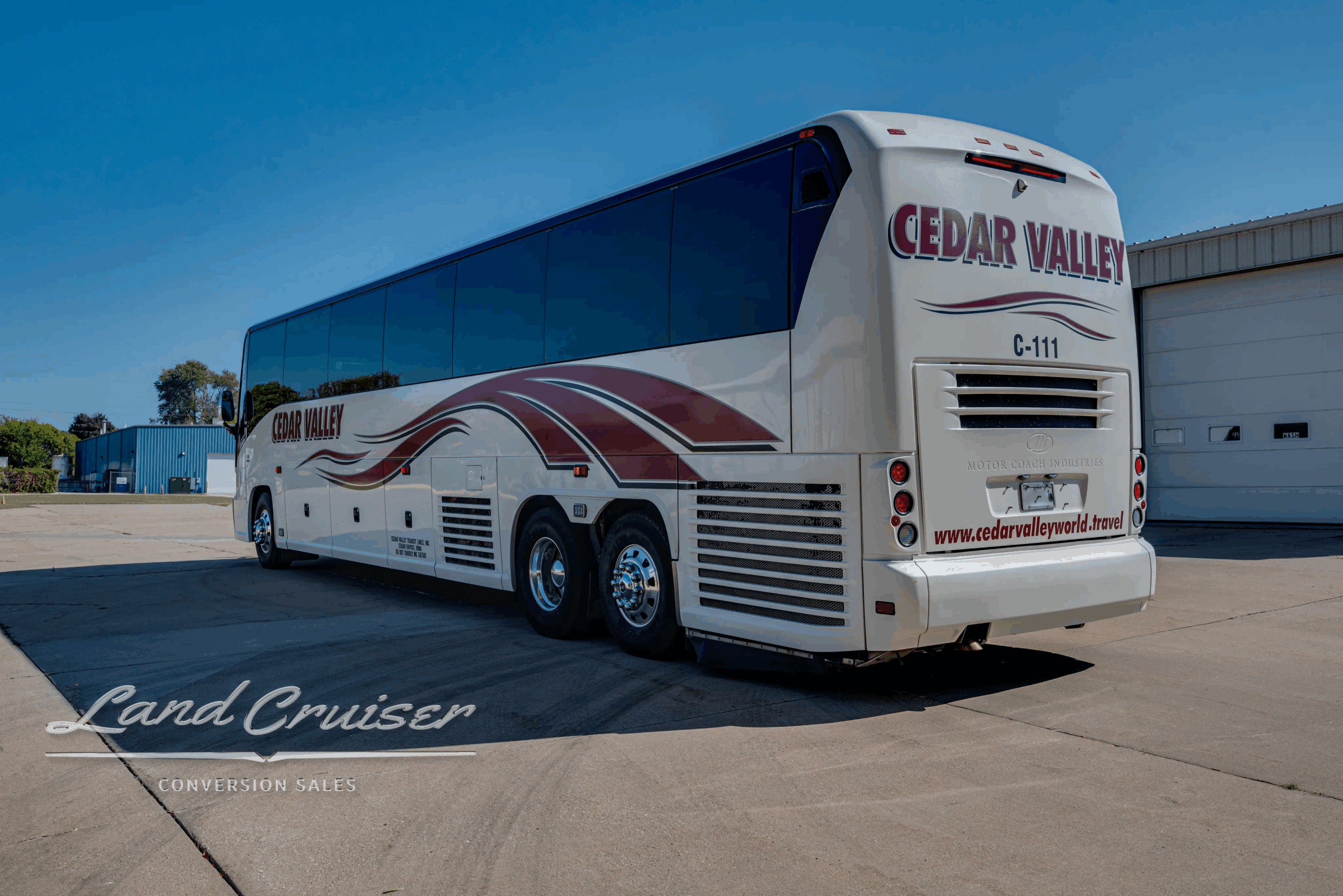 Rear-left three-quarter showing side graphics and engine area.