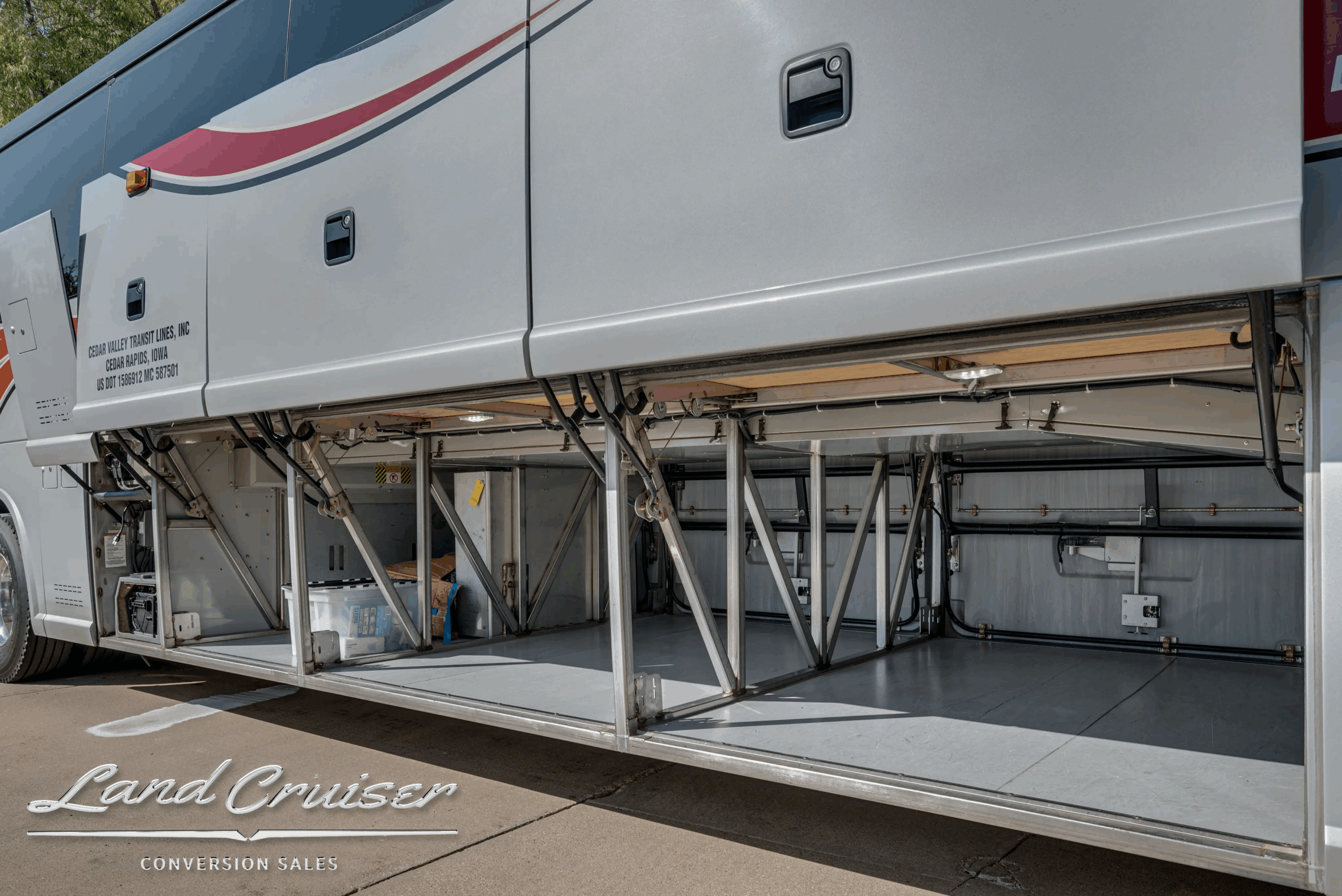 Side bay open showing radiator/cooling stack.