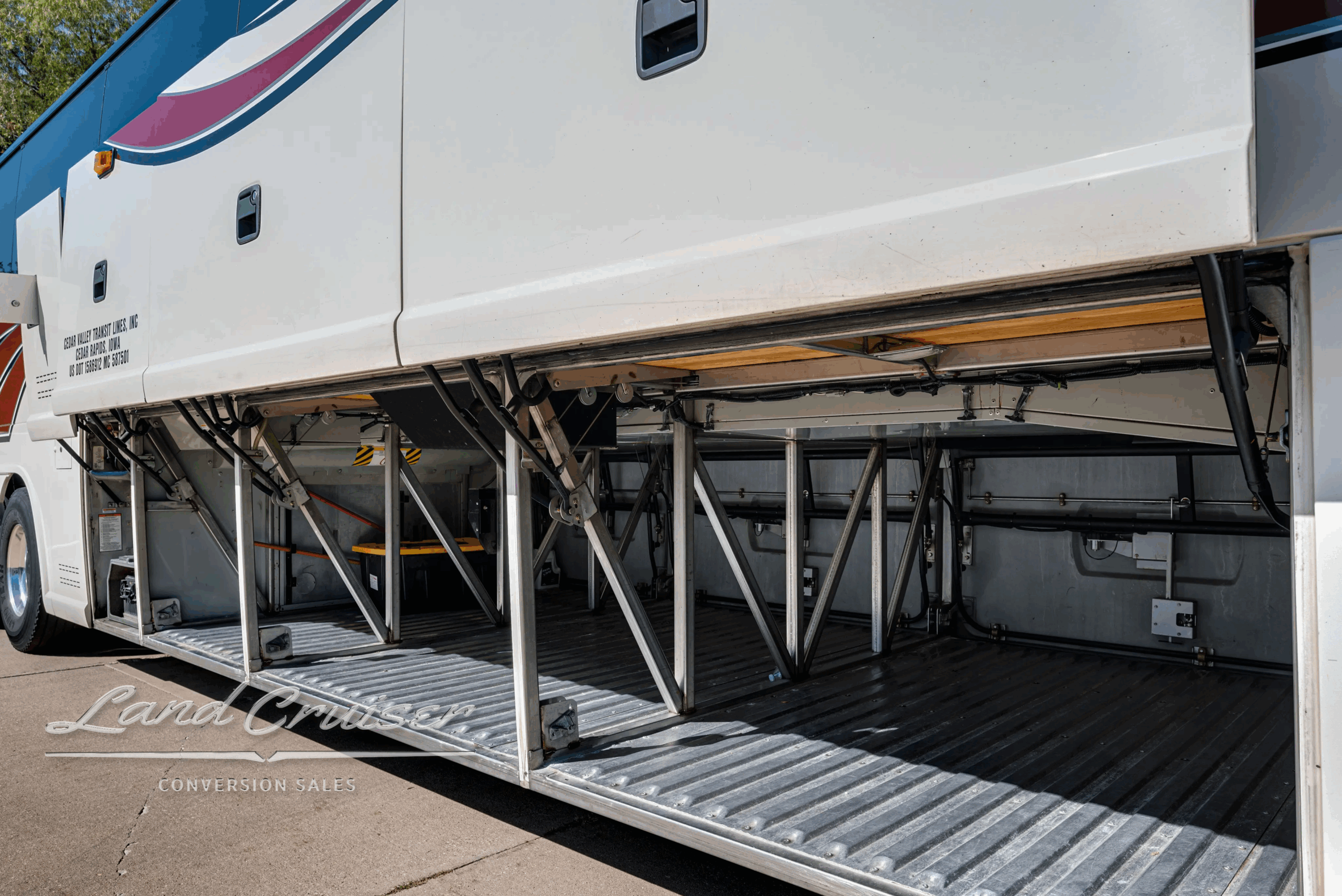 Overhead parcel racks and ceiling ventilation.