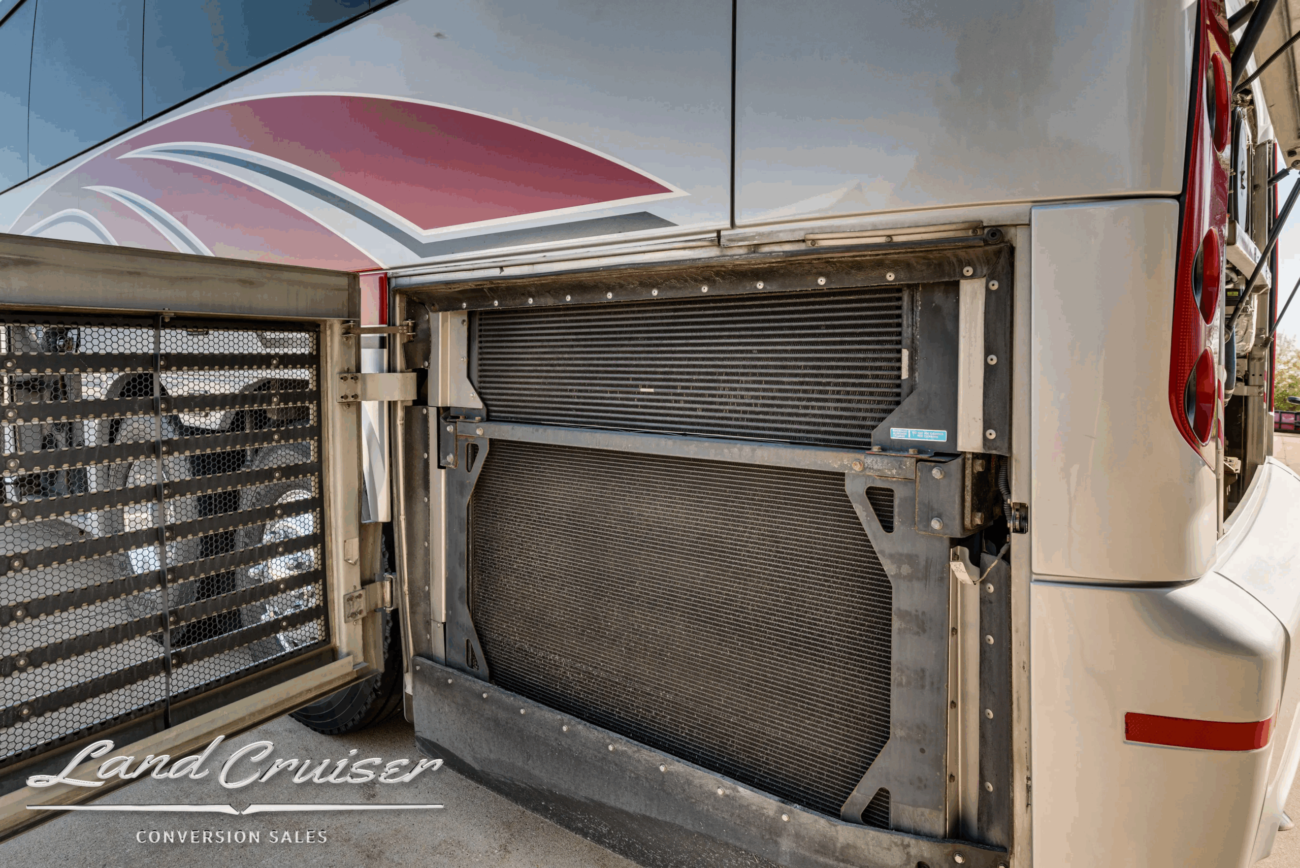 Side bay open showing radiator/cooling stack.