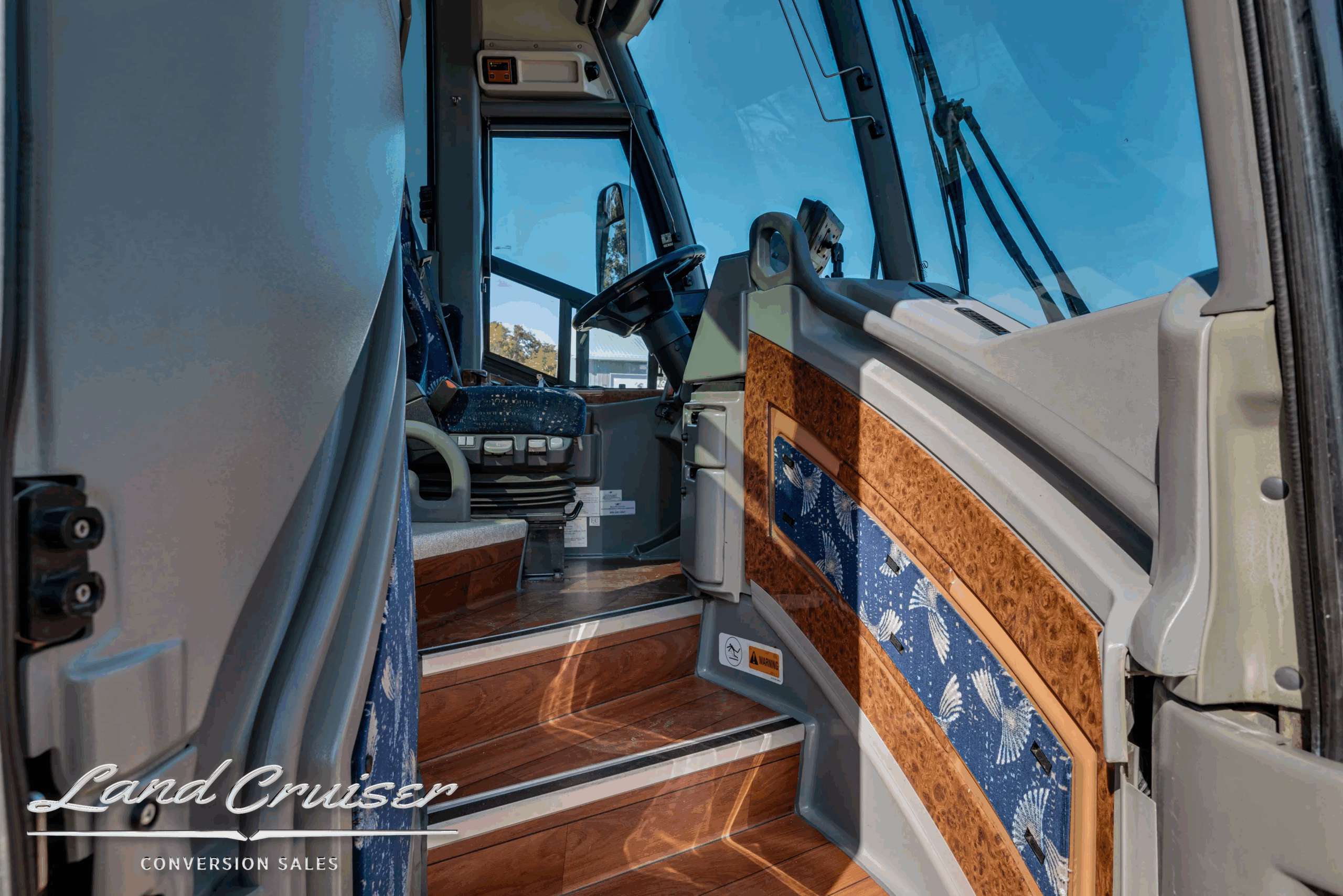 Entry stairwell and handrails leading into the cabin.