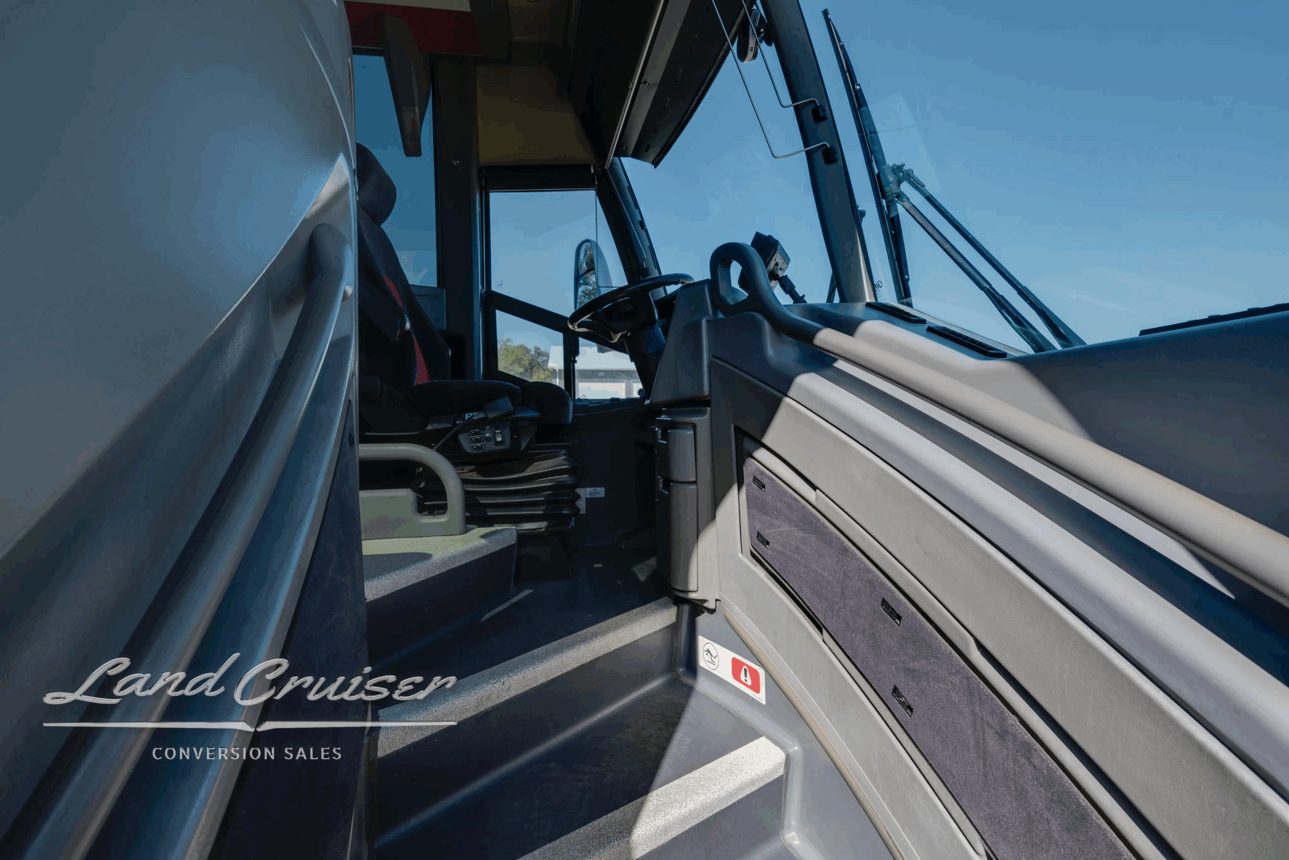 Driver doorway and mirror area looking into the cockpit.