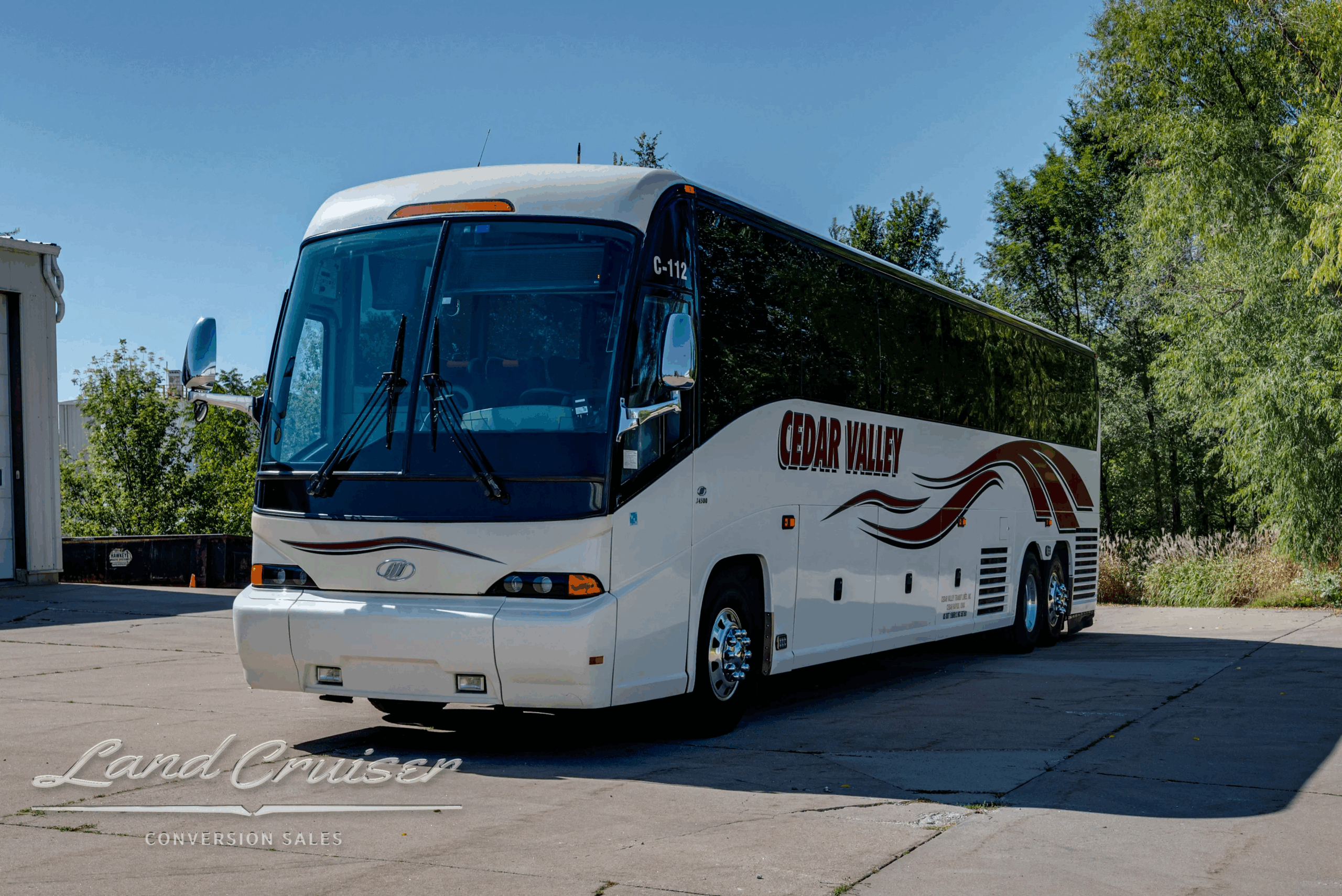 Front-right exterior near passenger entry door.