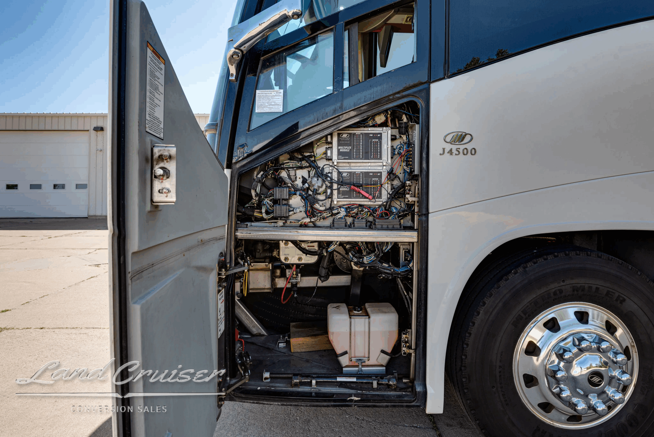Electrical and fluid service panel near the engine bay.