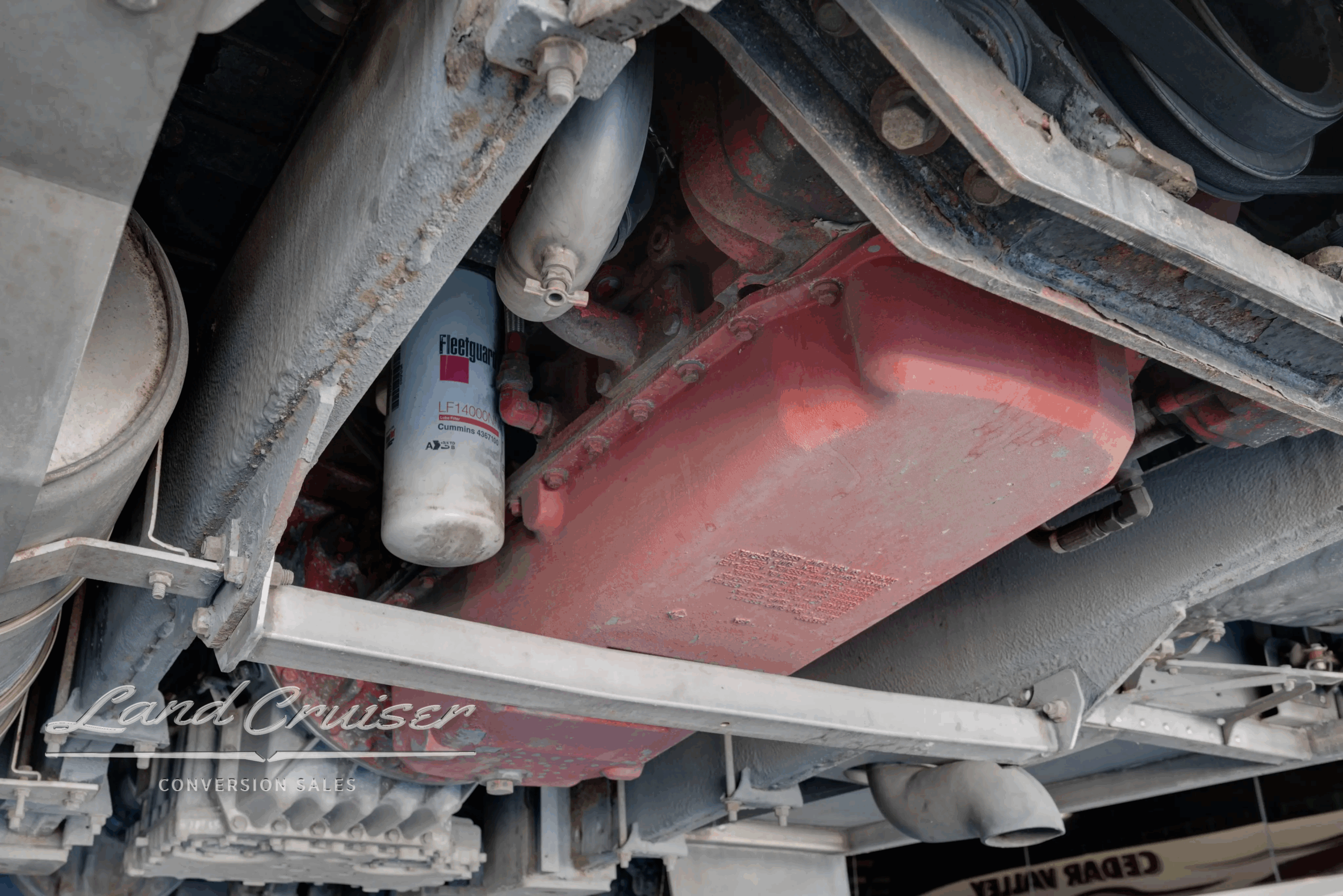 Forward undercarriage section with steering/sway components.