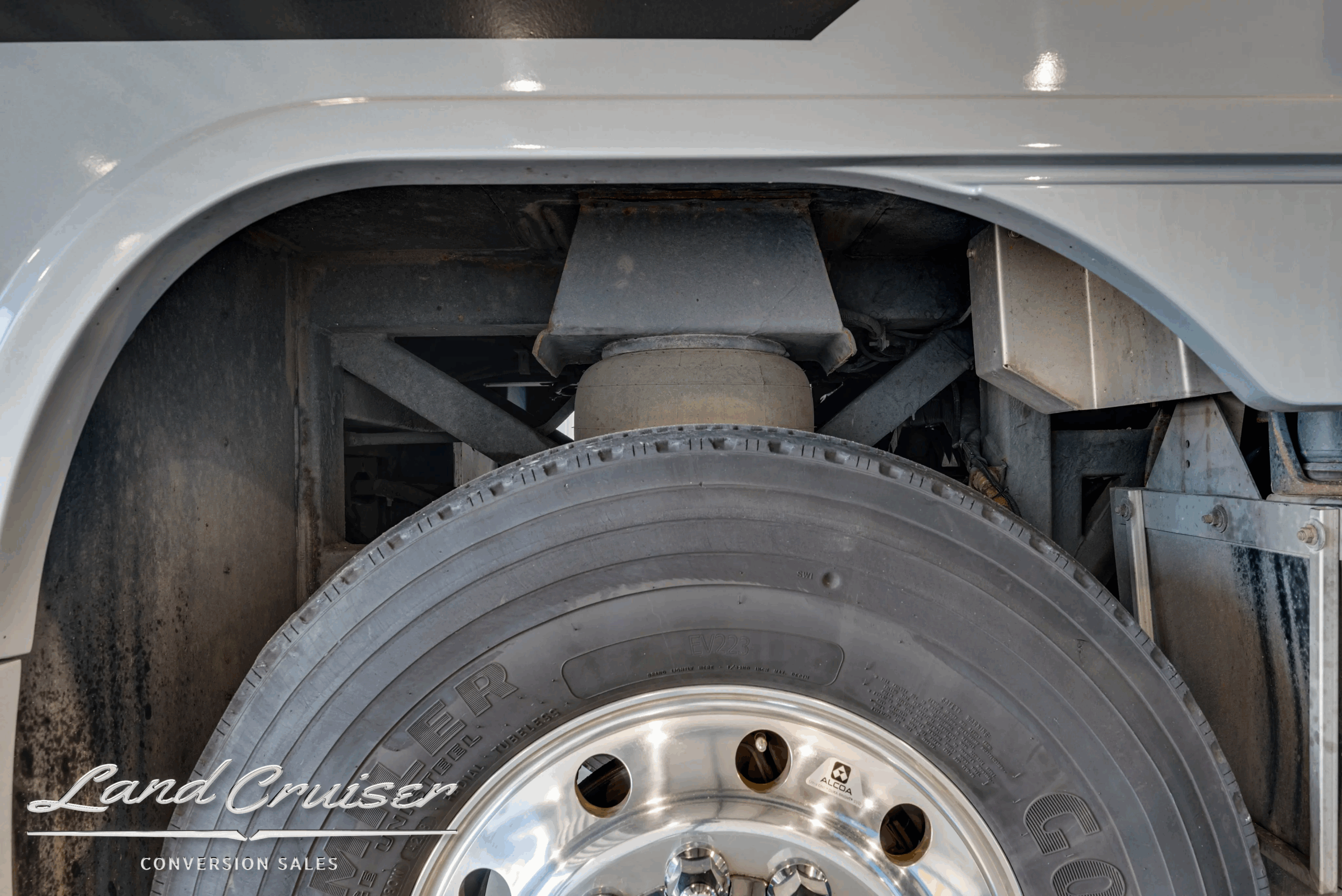 Rear wheel and tire with fender detail.