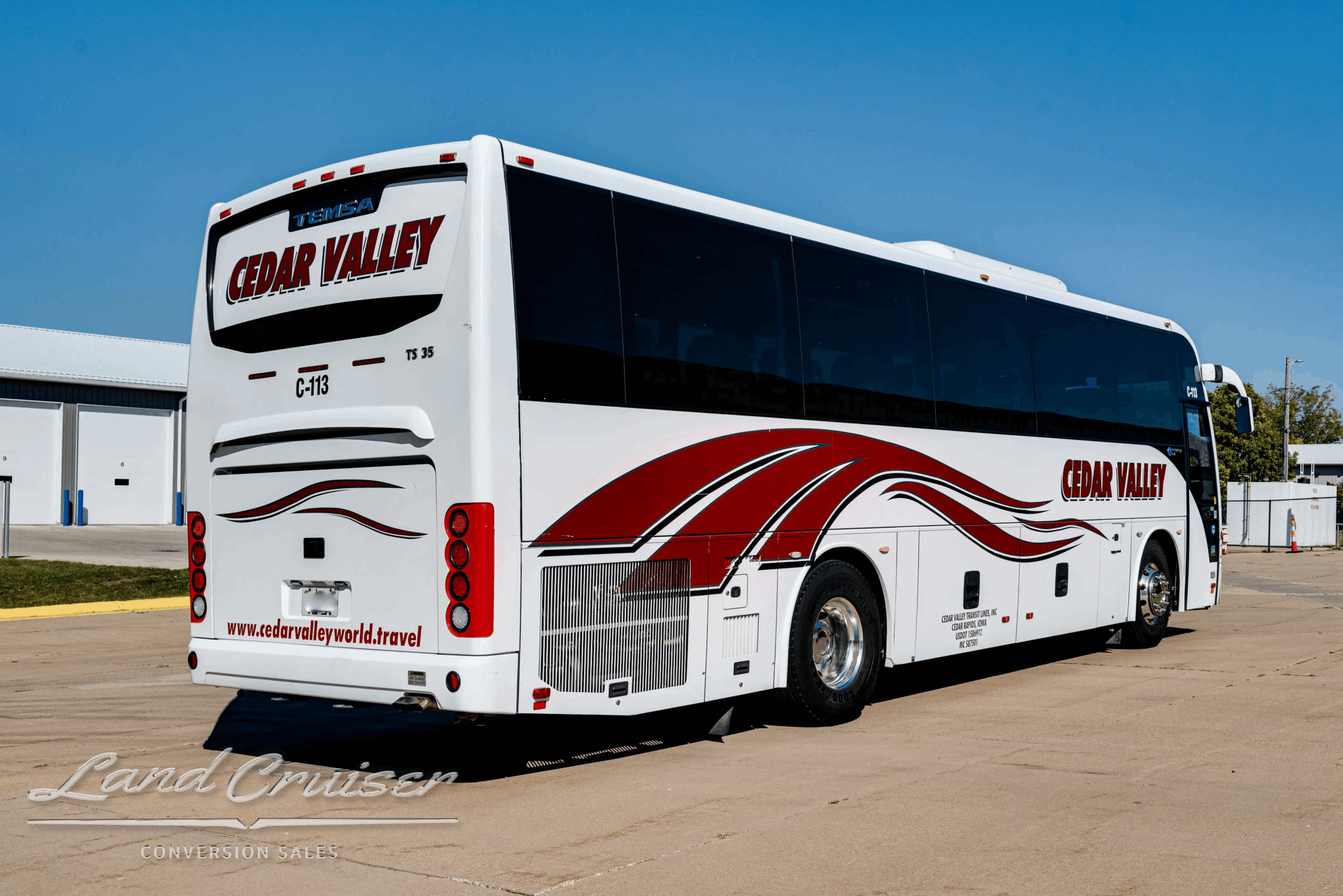Rear-left three-quarter with Cedar Valley graphics.