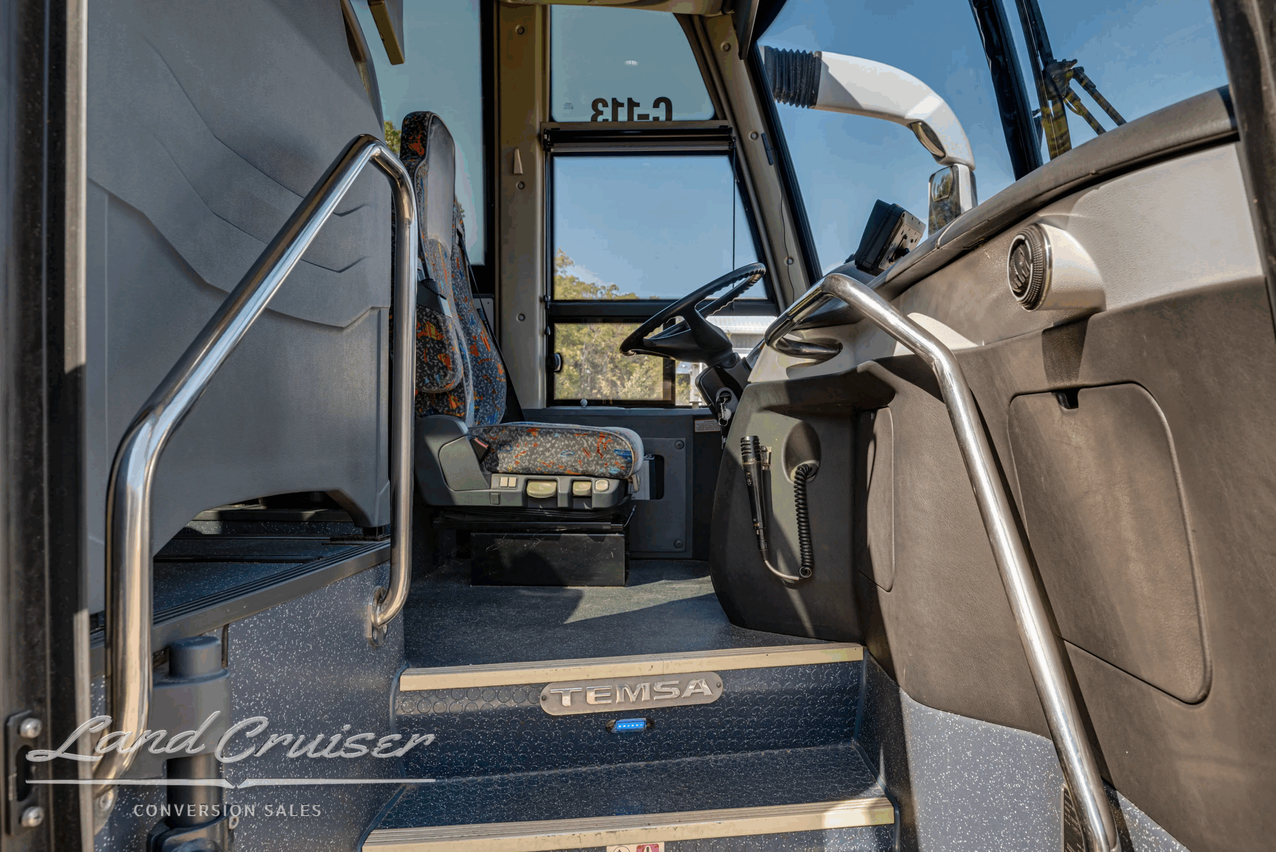 Entry stairwell and handrails leading to the cabin.