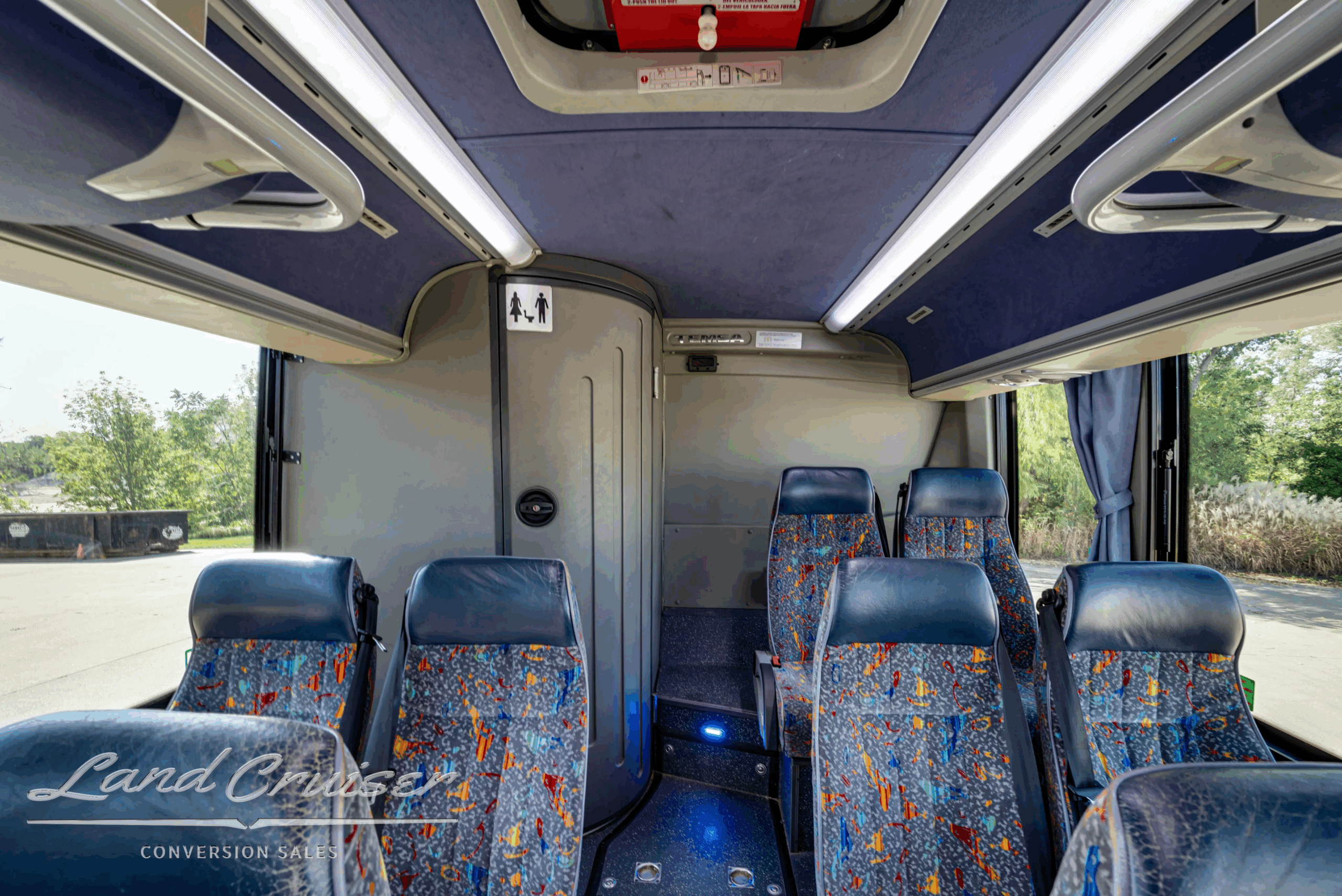Overhead racks and lighting mid-cabin.