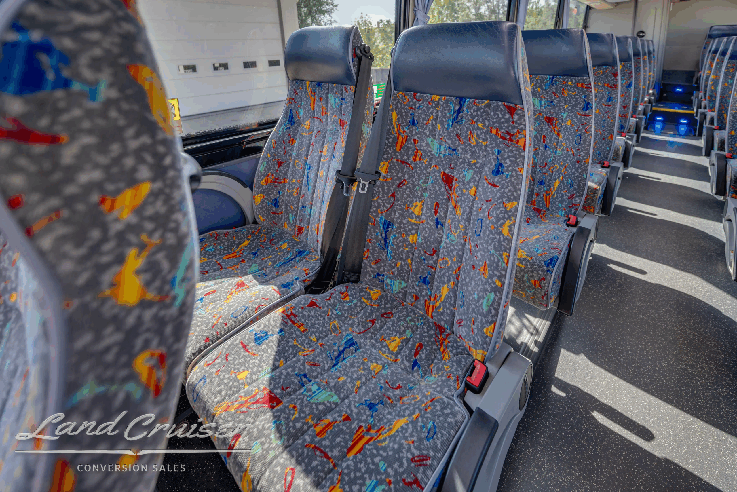 2012 Temsa T35 passenger seats, fabric upholstery close-up.