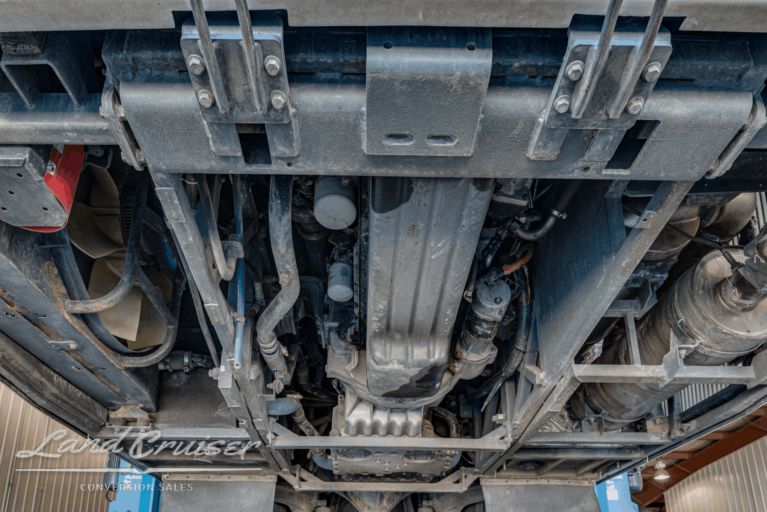 Front suspension and steering linkage close-up.