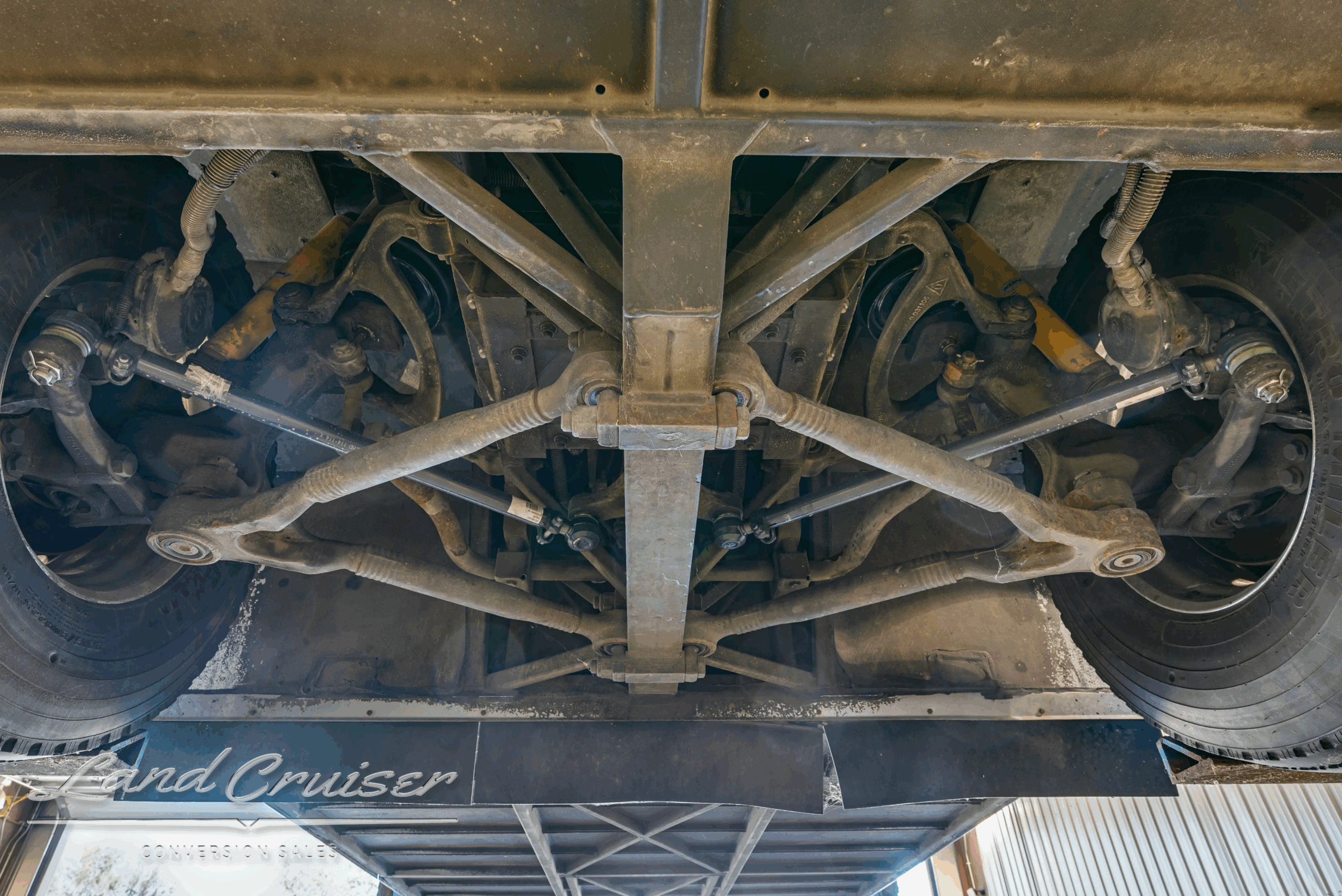 Crossmember and chassis underbody structure.