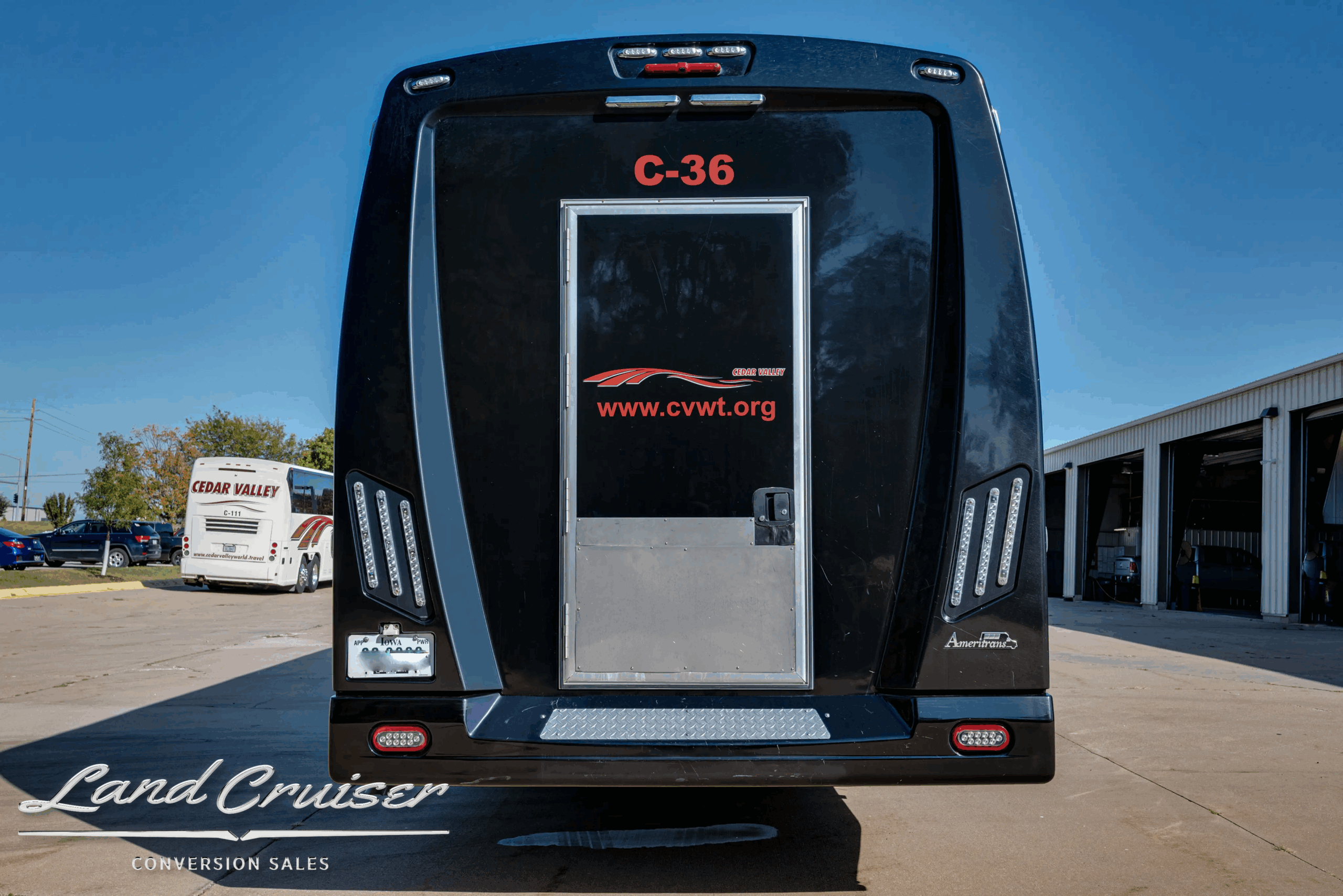 Rear view with C-36 badging on the Ameritrans passenger bus.
