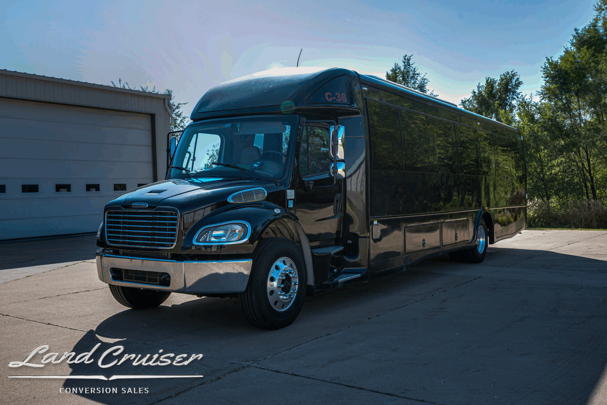 2015 Freightliner Ameritrans 32-passenger bus, front-left exterior view.