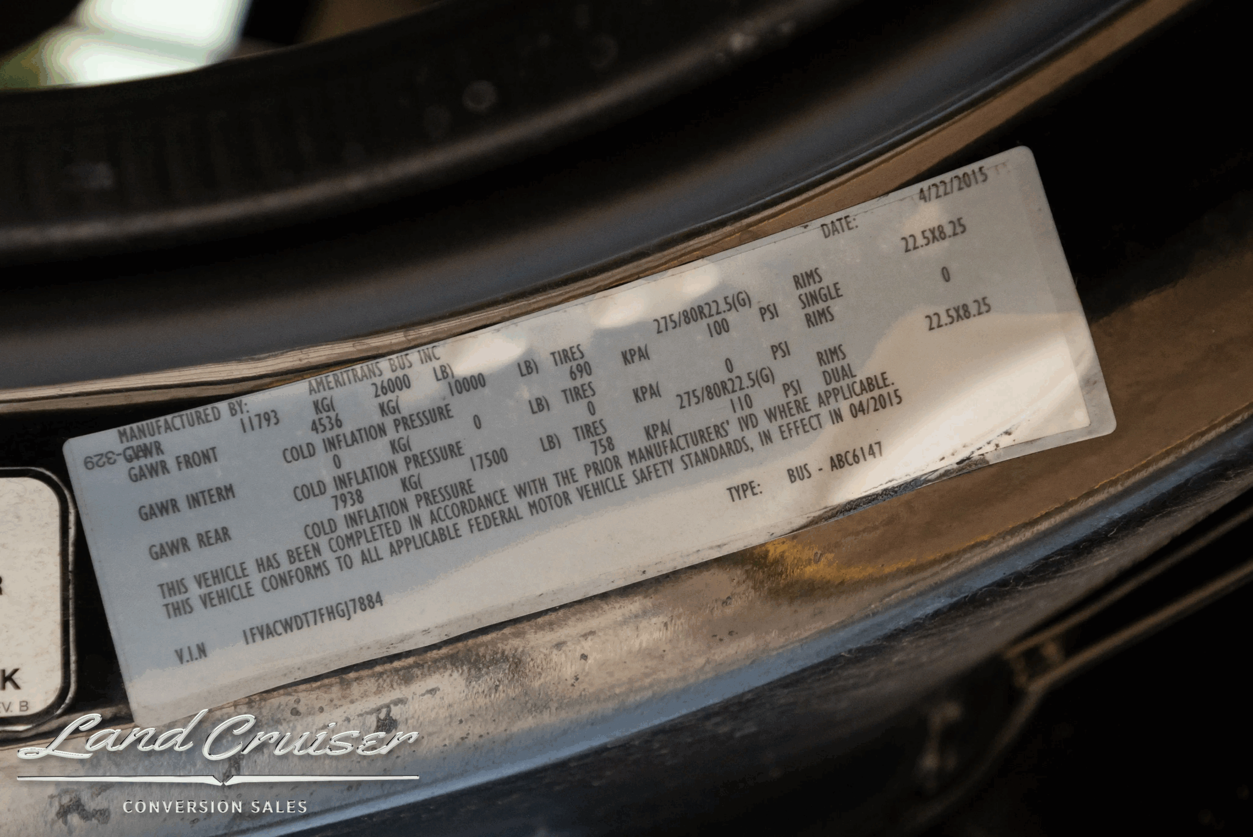 VIN/GVWR data plate on the Freightliner chassis.
