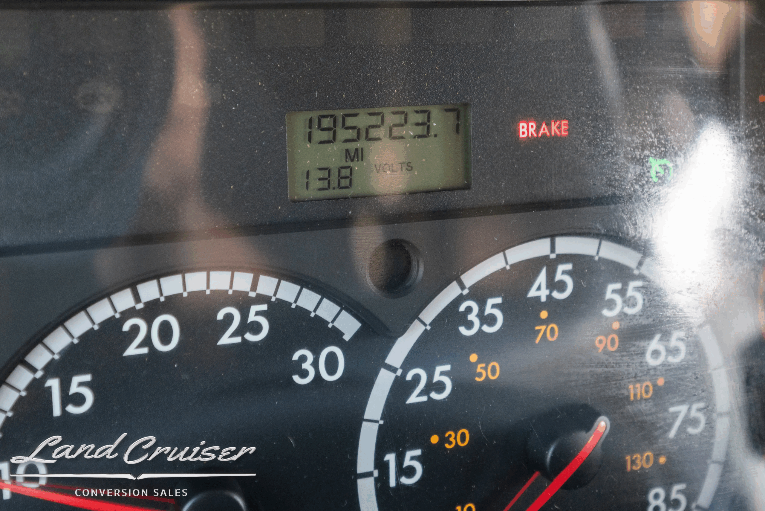 Odometer cluster showing 194,672 miles.